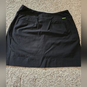 Elegant Black Skirt with Polka Dot Lining